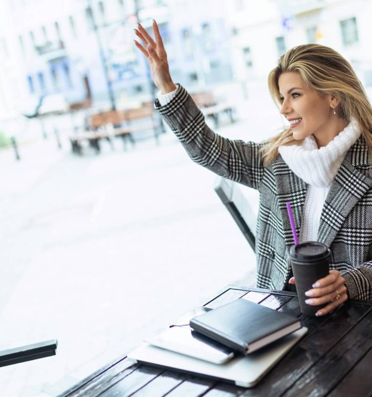 adult-female-hr-specialist-waiting-for-a-candidate-for-a-position-in-a-cafe-with-a-cup-of-coffee-and.jpg